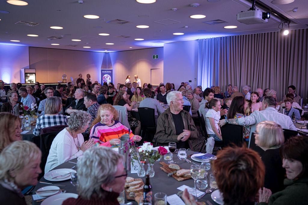 Guests at a dinner celebration